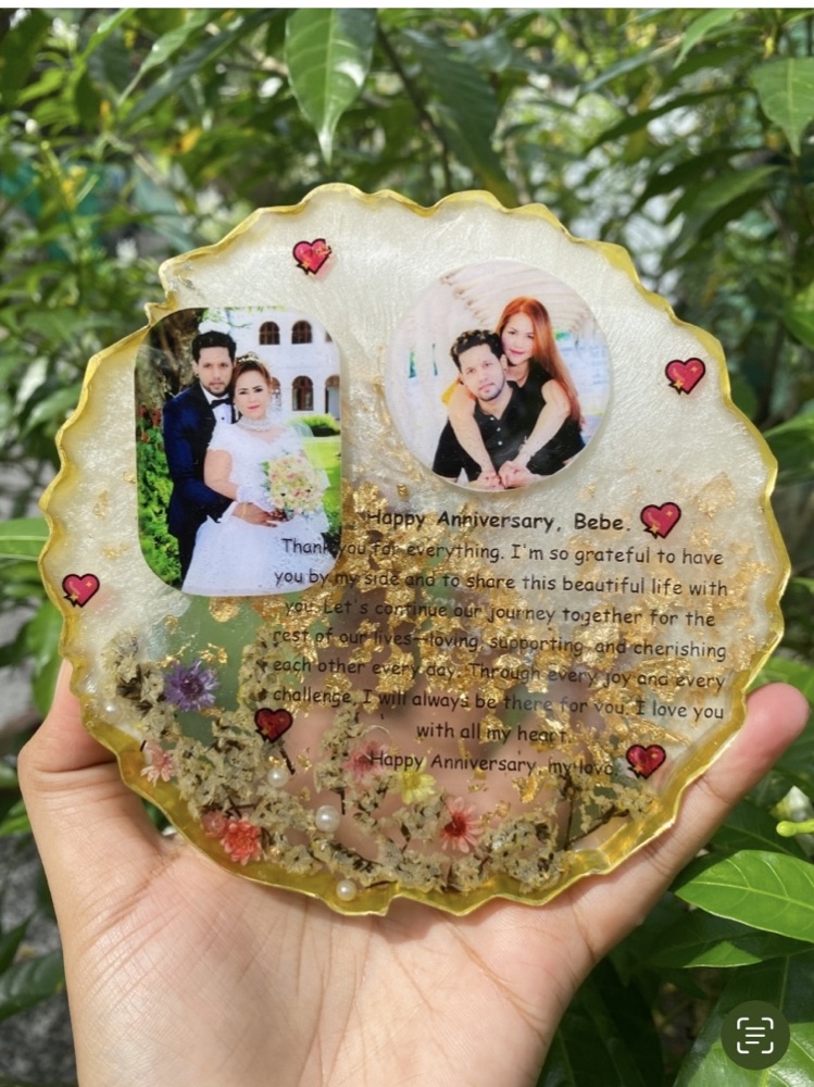 A personalized resin anniversary keepsake with photos and a handwritten message